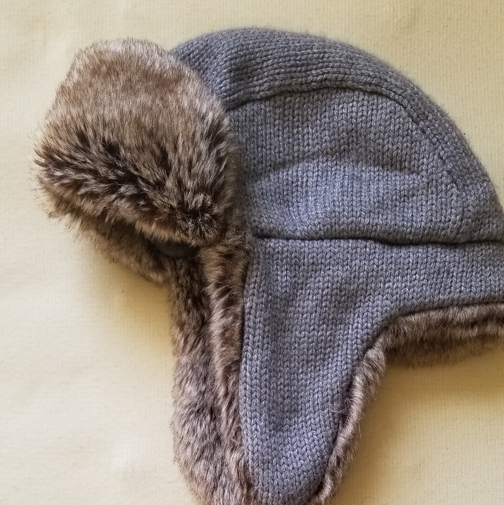 Preowned  winter hat with ear flaps need $$